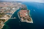 città